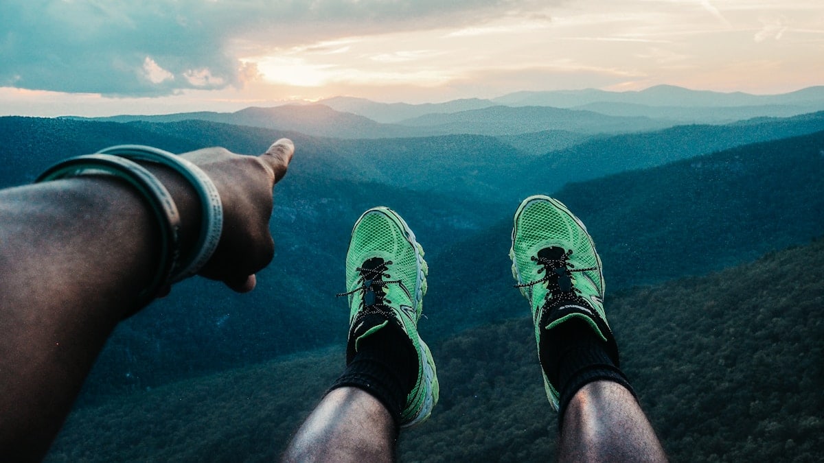 person wearing pair of green shoes